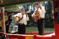 Xochimilco Mexico Tour: Fiesta on a Trajinera and Charming Coyoacan (Small-group / 6h)