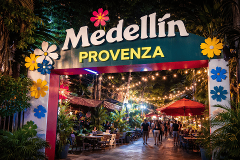 Medellín Cultural & Nightlife Experience (3 Days / 2 Nights) A festive entrance adorned with flowers and string lights welcomes visitors to Medellin Provenza, a vibrant nightlife and cultural destination.