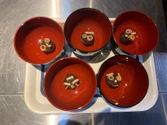 Samurai Miso Soup Making Experience in Nishio Aichi Five red bowls with small food items sit on a white tray.