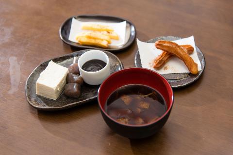 Step Inside a 400-Year-Old Miso Warehouse — The Hatcho Miso Experience in Okazaki, Aichi A simple Japanese meal of miso soup, tofu, and some fried items is presented on a wooden table.
