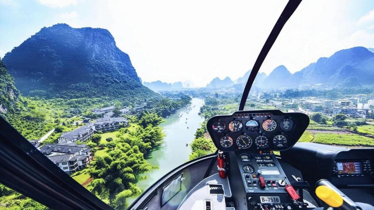 Helicopter flight experience in Yangshuo, Guilin, Guangxi [Overlooking the Ten-Mile Gallery, Yulong River, Fuli Ancient Town, and Li River]