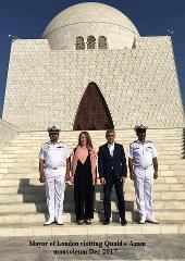 The Mayor of London stands with three people in front of the Quaid e Azam mausoleum in December 2017.