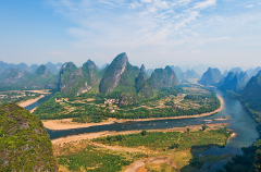 A scenic aerial view of the Li River winding through the karst mountains of Guilin, China.