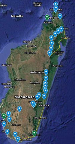 The image shows a map of Madagascar with a cycling route marked by blue and green pins, connecting various cities and towns from north to south.