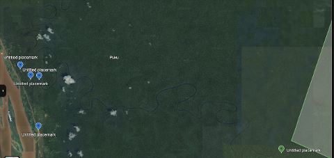 Satellite view of a dense jungle with a winding river and several placemarks, likely indicating points of interest for an expedition.