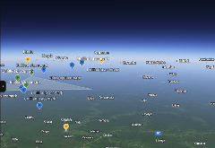A satellite view of the DR Congo displays a densely forested landscape dotted with numerous placemarkers and city names, indicating a remote expedition route.