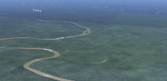 An aerial view shows the winding Lomami River flowing through the dense green jungle of the Lomami National Park in the Democratic Republic of Congo.