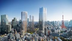 A panoramic view of Tokyo's skyline features modern skyscrapers and the iconic Tokyo Tower under a clear blue sky.