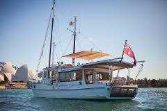 Private classic wooden boat charter for eight