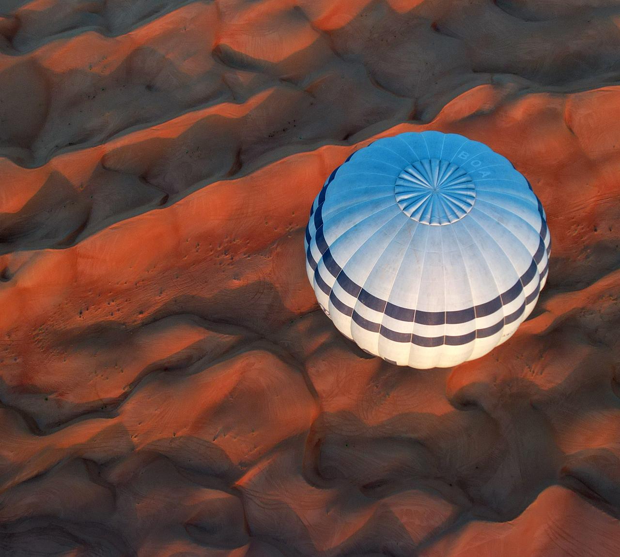 Hot Air Ballon flight in Wahiba Sands desert at sunrise 