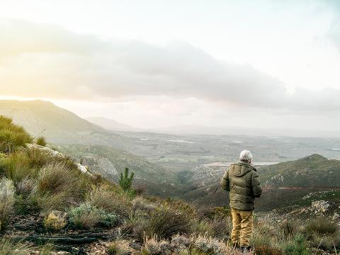 4x4_off_road_adventure_experience_person_standing_on_mountain_top