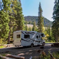 Camper Van Parking Spot incl. Water & Electricity at Mad Goats Sjoa River - Heidal, Norway