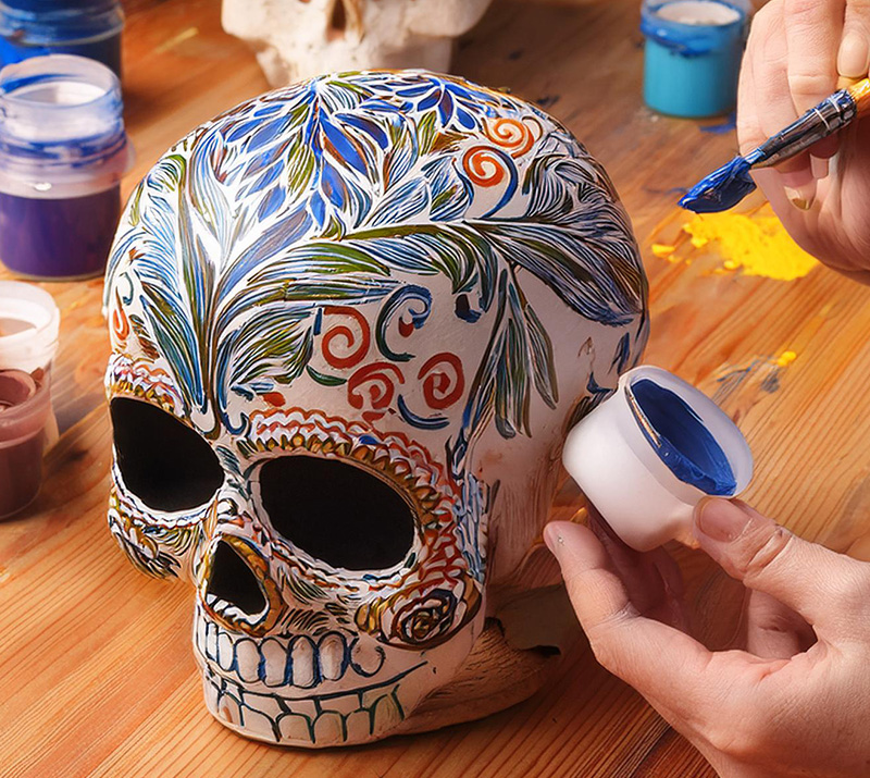 Paint your own Día de los Muertos ceramic skull 