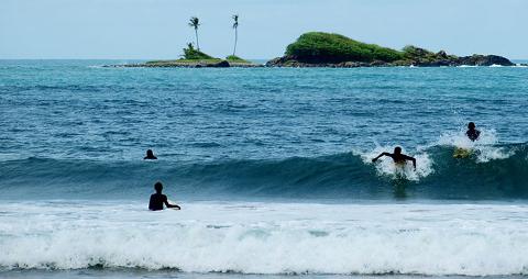 Surfers_Surfing_at_Busua_Beach_in_Western_region__Ghana__1_