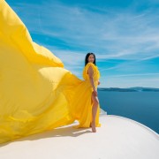 Santorini: Professional photoshoot with a flying dress VIP