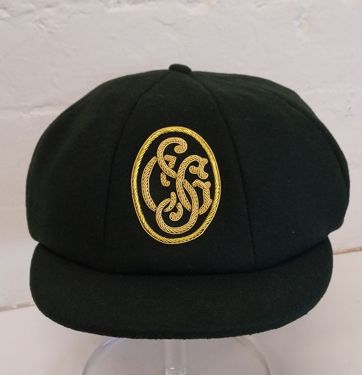 Gift Voucher for 2 guests & an SCG branded traditional cap.