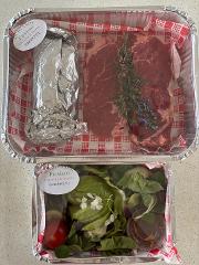 Local lamb cutlets or beef steak with salad & garlic bread for two