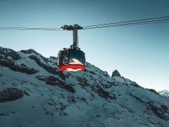 Private Mount Titlis Day Tour: Ice Cave, Cliff Walk & Alpine Adventure
