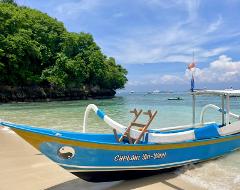 Private snorkeling tour with traditional outrigger wooden boat, Departing Nusa Lembongan.