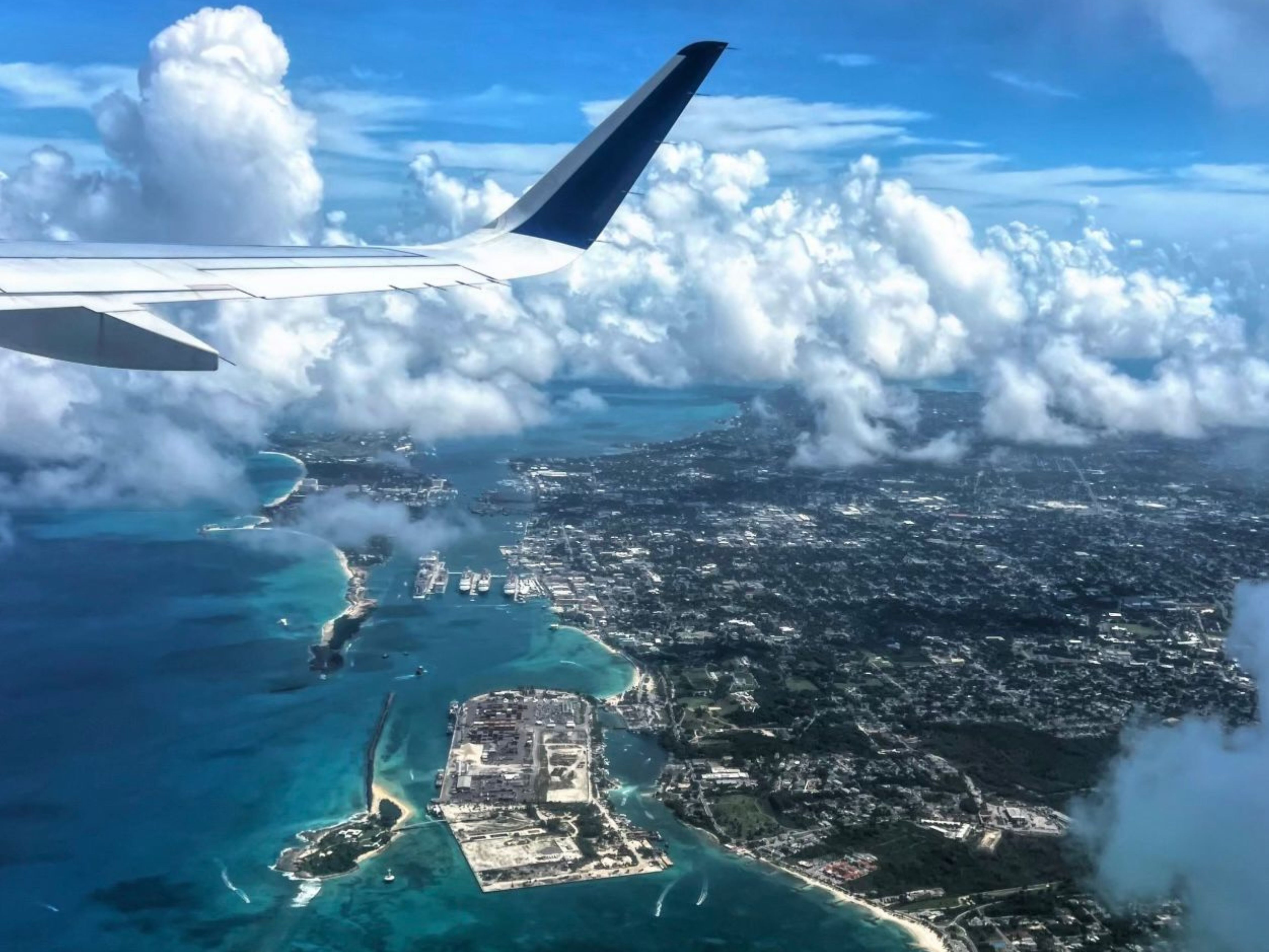 FLIGHT & BOAT MIX: EXUMA SWIMMING PIGS ABOVE & BELOW  [FULL DAY]
