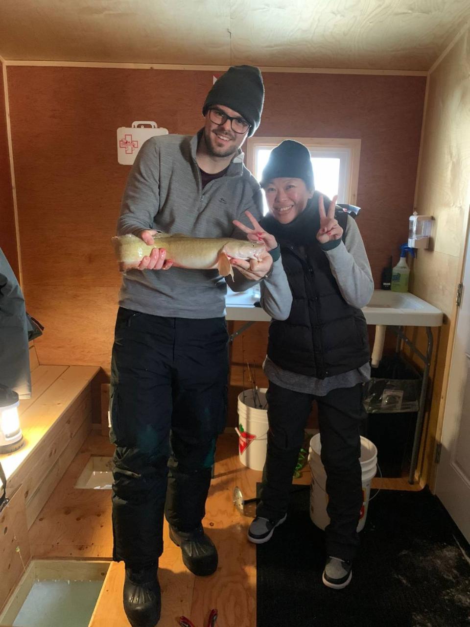 YELLOWKNIFE ICE FISHING TOUR IN HEATED SHACKS Sport Hands on Fishing Experience Arctic Tours