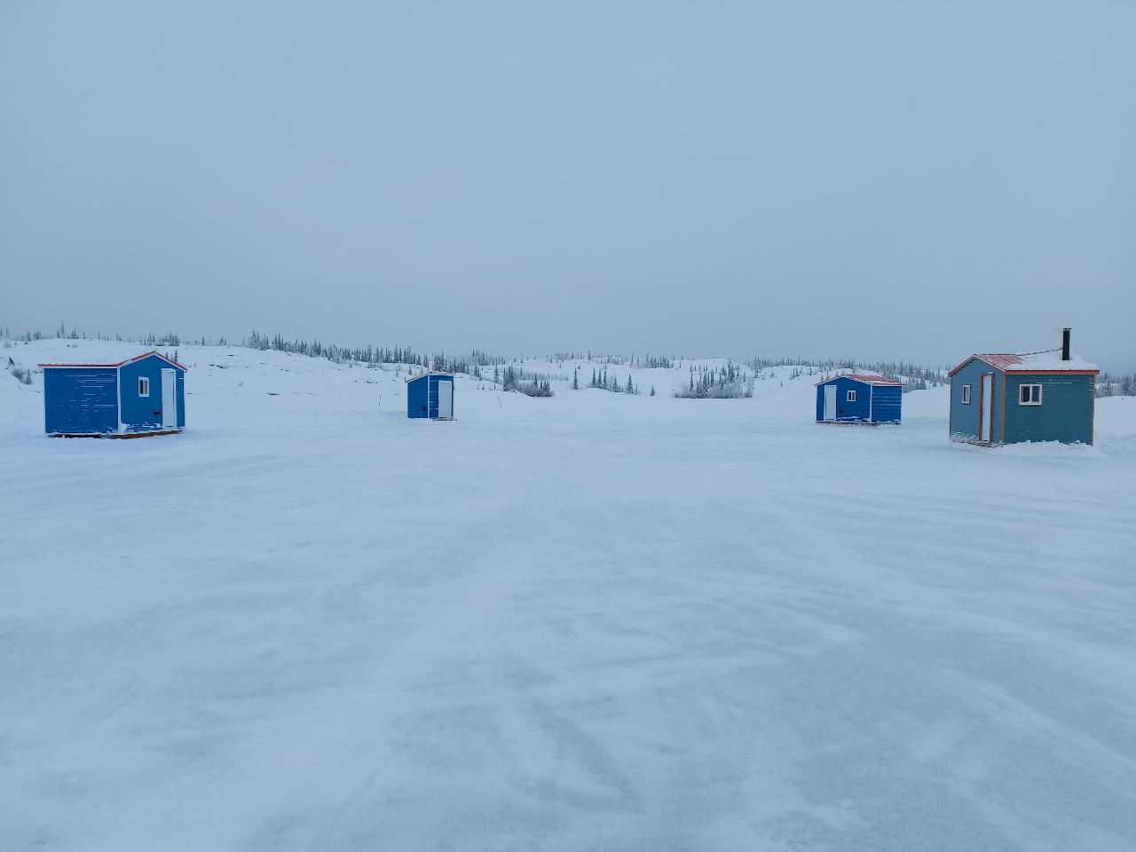 YELLOWKNIFE ICE FISHING TOUR IN HEATED SHACKS Sport Hands on Fishing Experience Arctic Tours