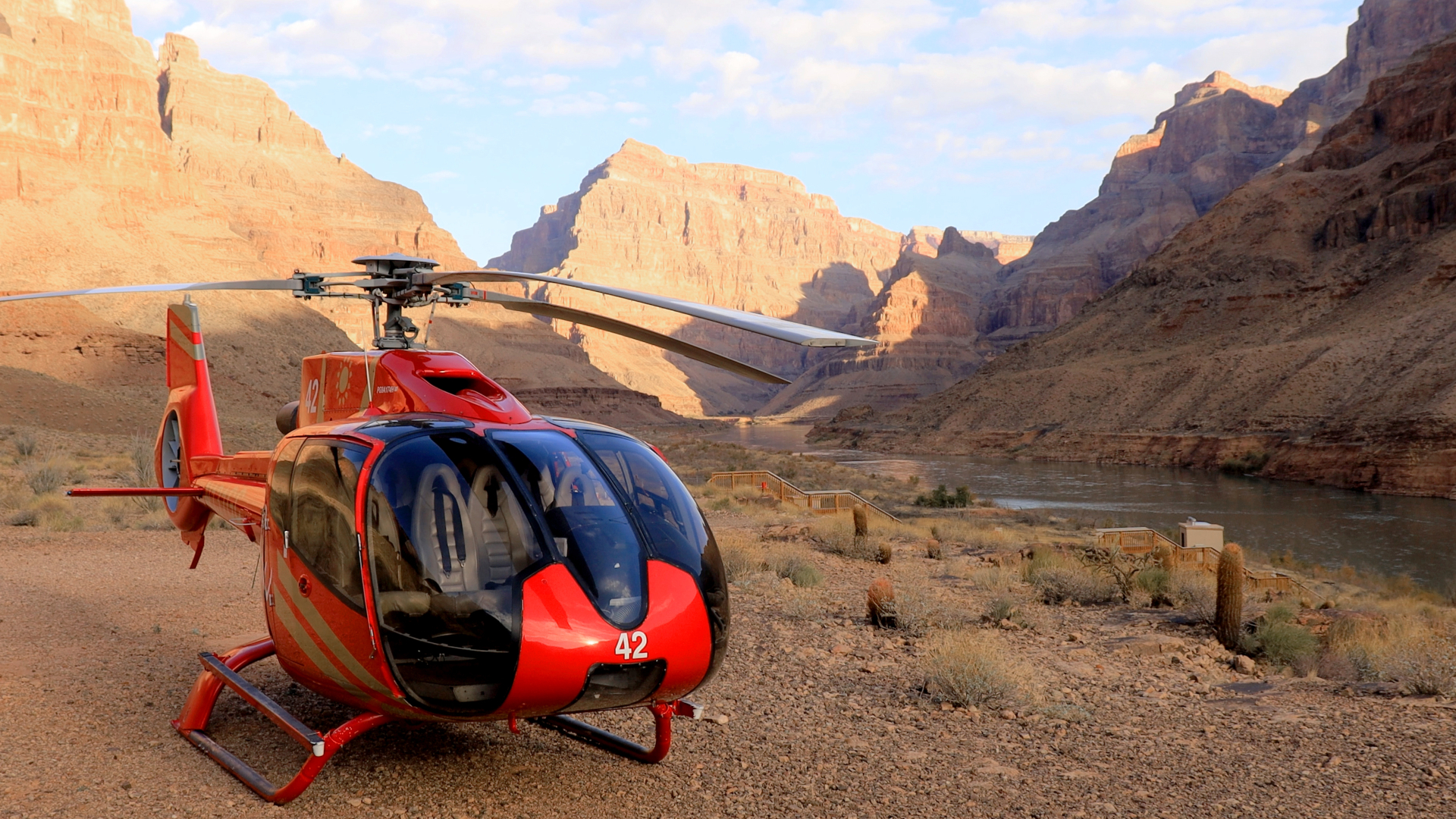 Over the Edge Grand Canyon Tour with Helicopter and Boat | Park Entrance and Meal Included