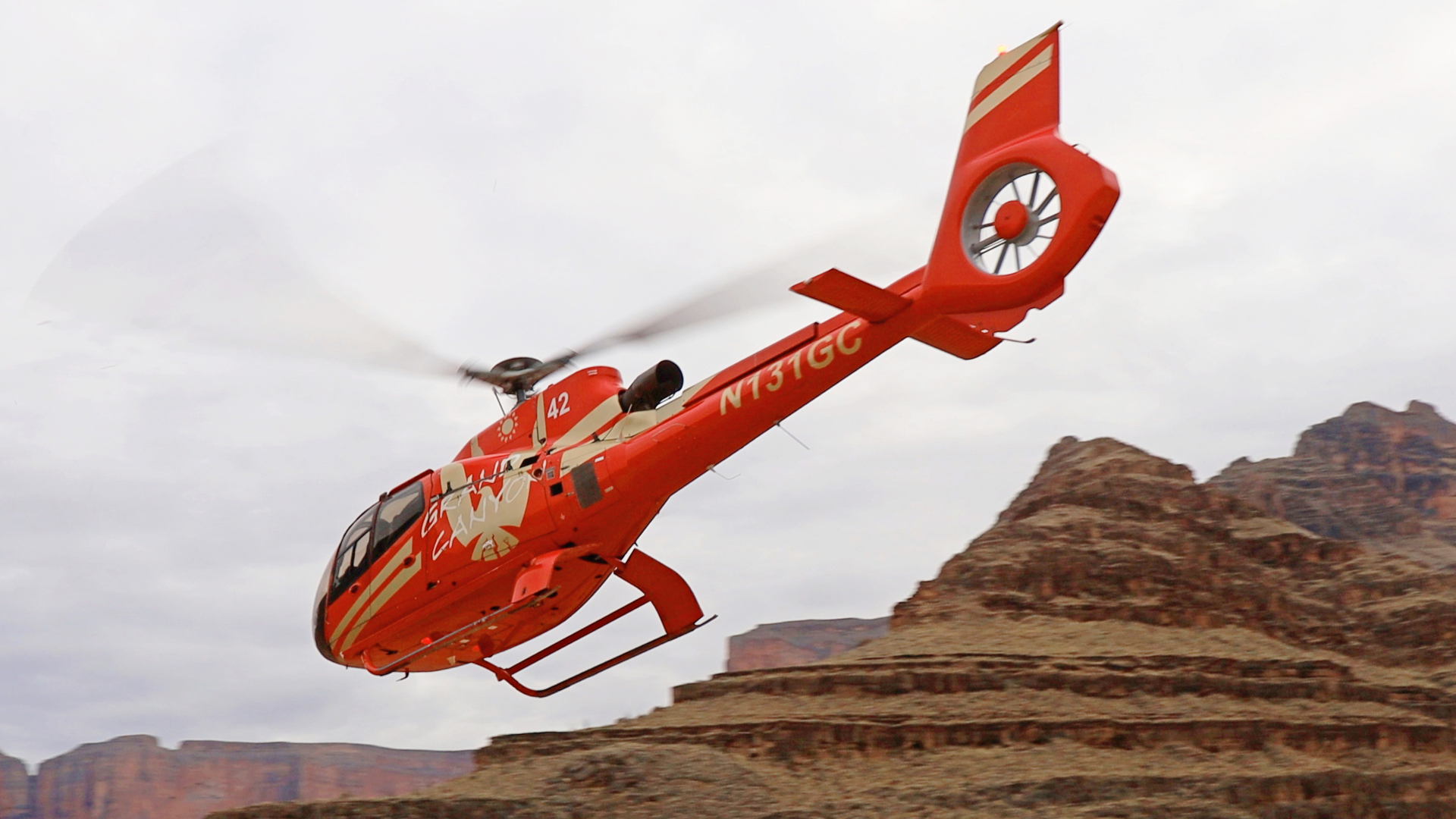 Over the Edge Grand Canyon Tour with Helicopter and Boat | Park Entrance and Meal Included