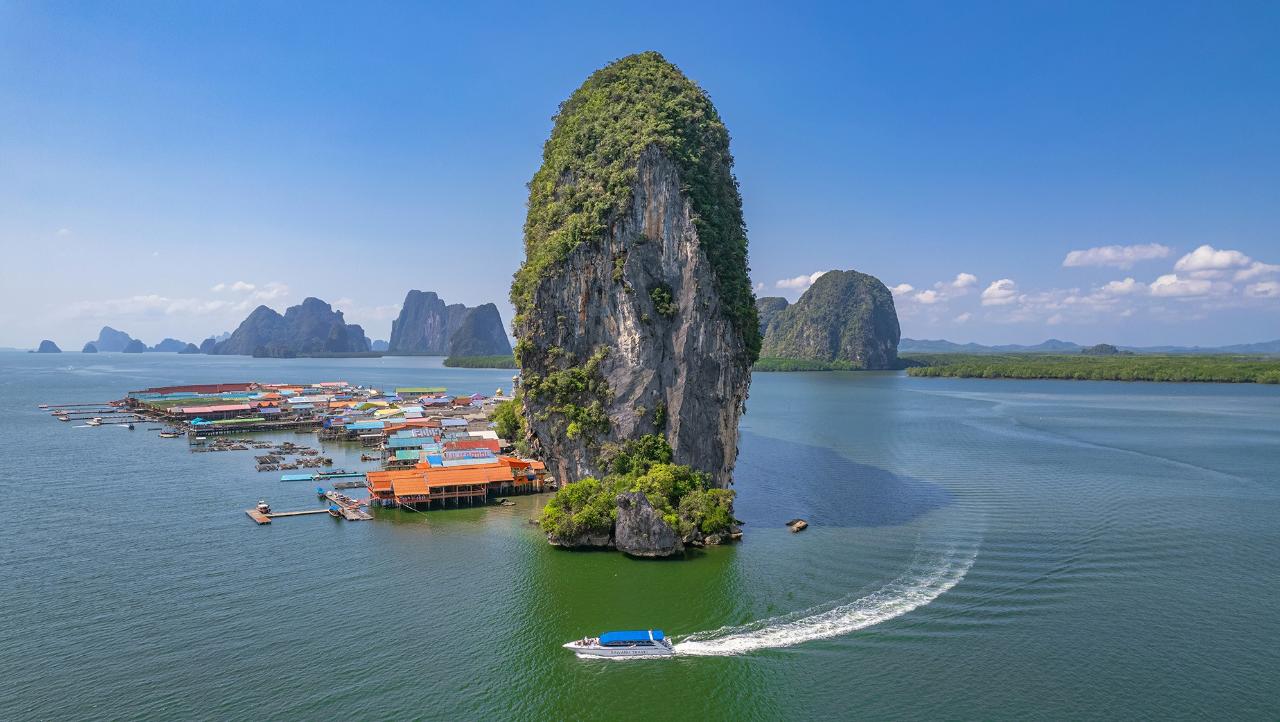 Discover James Bond Island in Phang Nga Bay by Powered catamaran and canoe