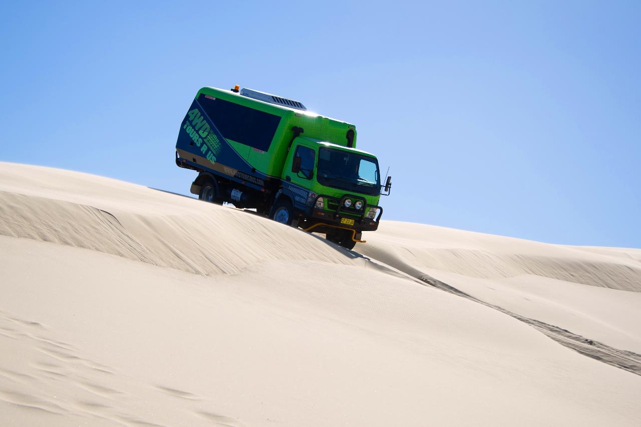 Sandboarding in Port Stephens Stockton beach dunes