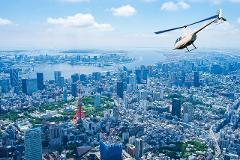 Private Helicopter Tour of Tokyo A helicopter tours over the cityscape of Tokyo, with a view of the Tokyo Tower and distant bridges.