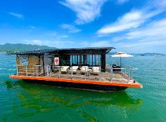 Experience a Dinner Cruise with Authentic Kyoto Maiko on the Sea Restaurant 'HANAIKADA' Against the Backdrop of the Miyajima's Grand Torii Gate