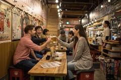Night Food Tour Visiting Locally Loved Bars & Cycling