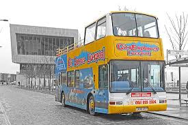 "Live Guide" Open Top Bus Hop on & off City Explorer & guided 90-minute Beatles themed walking tour combined ticket includes "Double Fantasy" John & Yoko exhibition & visit the Cavern Club