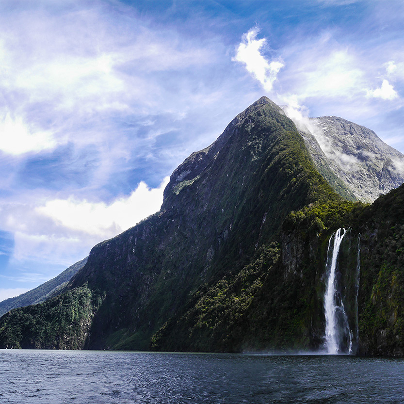 https://img.rezdy.com/PRODUCT_IMAGE/90077/31f9a2ddef7e42468550ce3a54523fc8Milford_Sound_waterfall.jpg