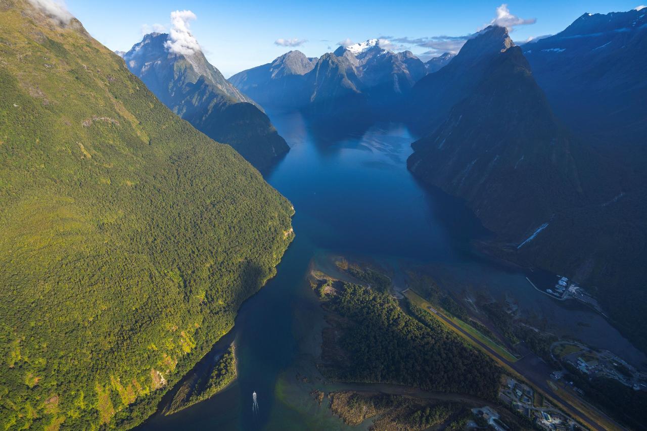 https://img.rezdy.com/PRODUCT_IMAGE/90077/Birds_eye_view_of_Milford_Sound.jpg